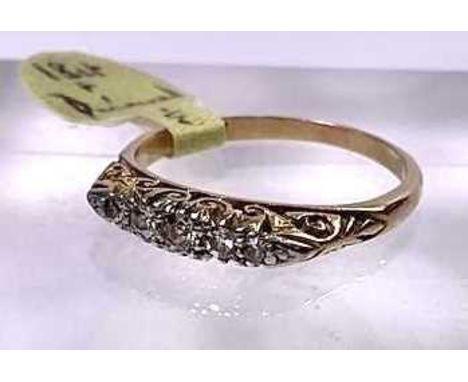 An early 20th century 18ct gold old-cut diamond five-stone ring, estimated total diamond weight 0.15ct, band stamped 18ct, ri