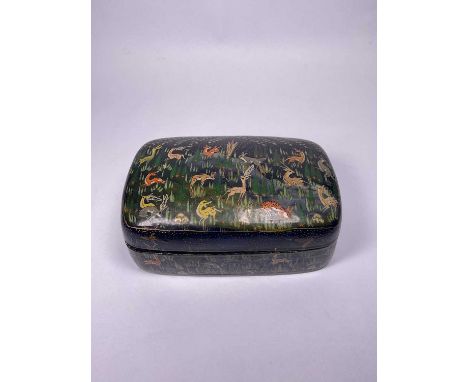 An Indian hand painted papier mâché box containing a jade-coloured bangle and costume jewellery to include micromosaic, white