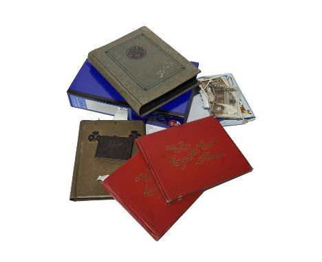 A collection of early 20th century postcards, photographs and Wills's cigarette card albums relating to transportation and lo