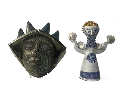 A Martha Allen ceramic mask/planter, signed to reverse c.1985, 25 by 25cm together with a blue and white figurine, modelled w