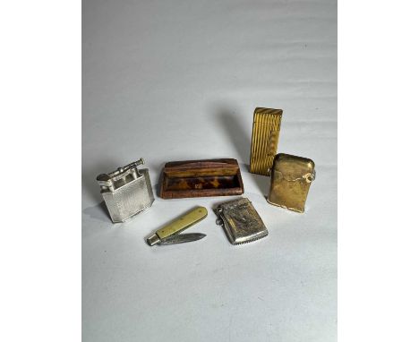 A 19th-century burr snuffbox lined with tortoiseshell, a white metal Dunhill lighter, yellow metal Thorens lighter and a Dunh