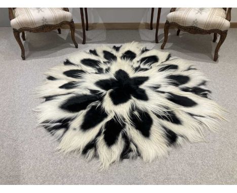 A Black and White Colobus Monkey (Colobus angolensis) full circular fur rug, circa 1960s, circular form, authentic non-endang
