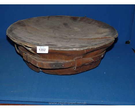 An enamel campaign wash Bowl with leather cover and carrying handle.