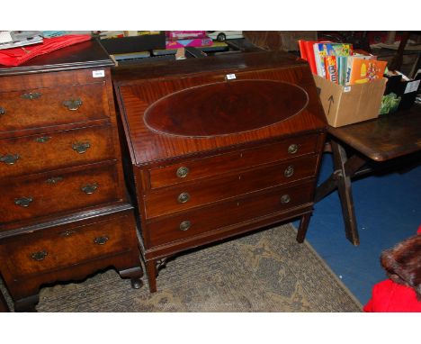 A 1930's/40's Mahogany Bureau, the slope front having patent action drawing forward, nicely fitted stationary stand with two 