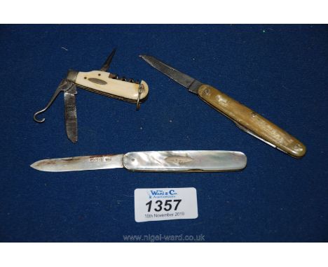 Three vintage Penknives, one with silver blade.