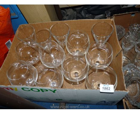 Four large wine goblets, four large gin balloons and four wine glasses.