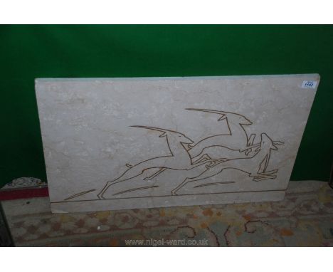 A marble Art Deco carved/inlaid outline of leaping gazelles.