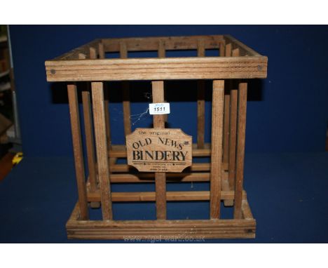 An ''The Original Old News Bindery'' vintage newspaper stacking crate.