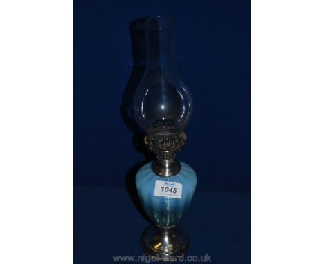 A Victorian vaseline glass oil Lamp, hallmarked silver base and lamp fitting, London 1888.
