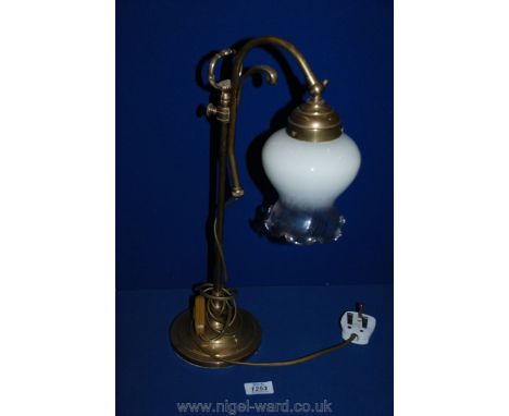 A brass table Lamp with ombre glass shade.