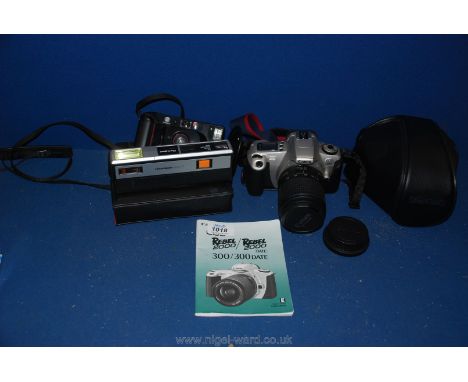 A Minolta AF-DL Camera and case, a photo sport and flash camera, lens cover and Canon Eos 300 camera and case with instructio