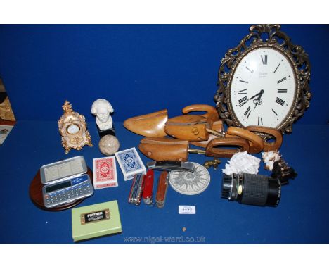 Miscellaneous items to include two pairs of wooden shoe stretchers, auto Makinon zoom 1-4-5 f = 80-200 mm lens, playing cards