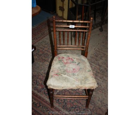 A child's Chair with floral seat