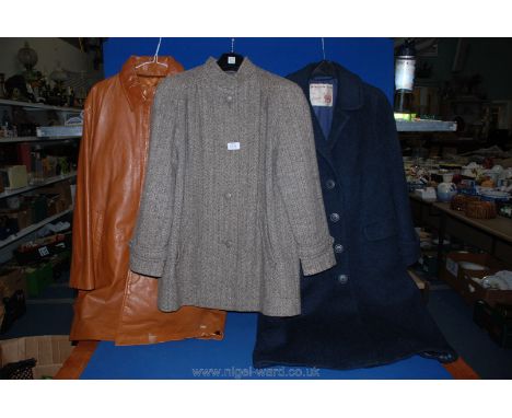 Three vintage coats including Welsh tweed and leather.