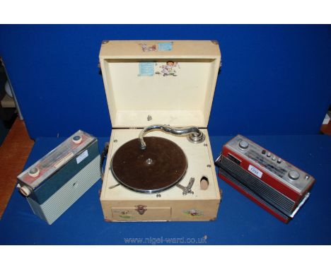 A small Bush radio together with a small Roberts radio RT22 and a child's record player decorated with nursery rhymes a/f.