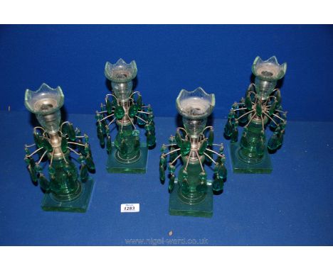 Four pale green vintage chandelier glass candlesticks with glass droplets, 10 1/2" tall with one droplet missing.