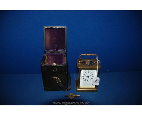 A Victorian carriage Clock by William Pearce of Bristol, fully working with key and original box.