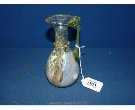 A highly collectable Roman glass Ewer/Jug of pale green colour with iridescence, of Piri form shape with applied stalk handle
