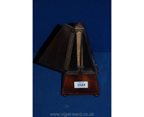 An early 20th c. French Metronome in Mahogany case, working.