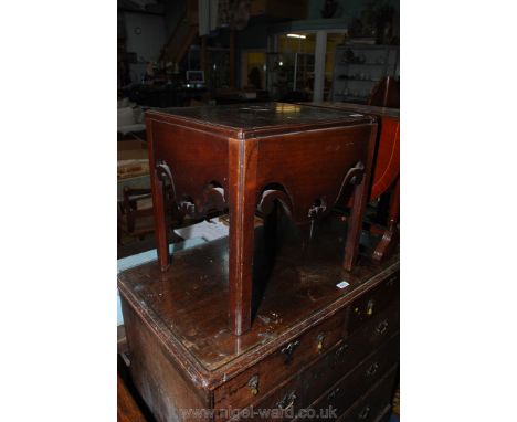 A Georgian Mahogany box Commode on square legs, the front and sides  having attractive fretworked details and having  hinged 
