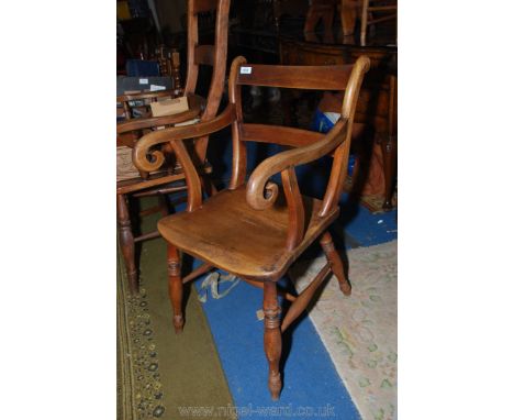 An Oxford bar back kitchen Carver Chair having solid seat, unusual scroll terminating arms and turned legs