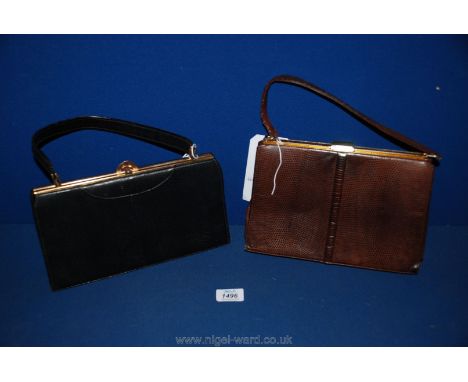 Two vintage handbags, one black, one brown.