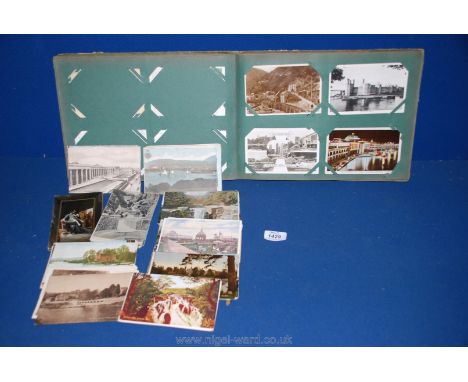 A quantity antique and vintage Postcards in album.