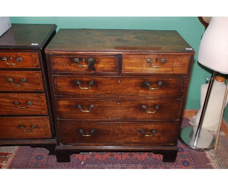A circa 1800 Mahogany Chest of three long and two short Drawers having brass swan neck handles and standing on bracket feet, 