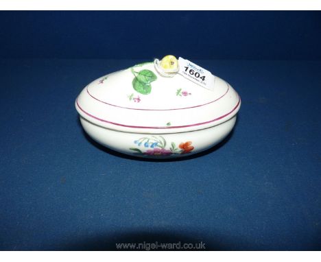 A 19th c. Royal Vienna porcelain oval Bowl and lid hand painted with flowers with leaf and pear shape finial, 6" long.