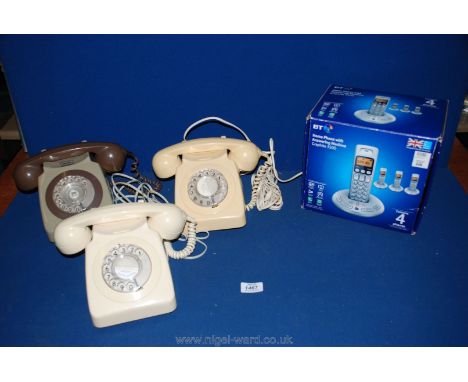 Three vintage Telephones and one digital