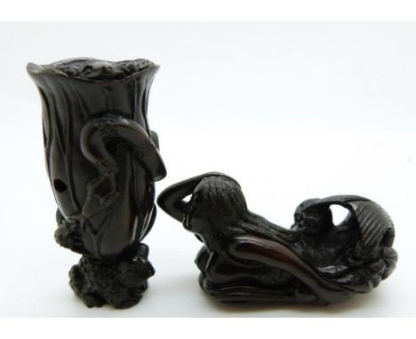 Japanese dark wood netsuke depicting a small frog carrying a tree trunk with another frog on the top, together with a Japanes