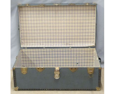 A metal bound twin handled vintage trunk, W91 x D50 x H37cm