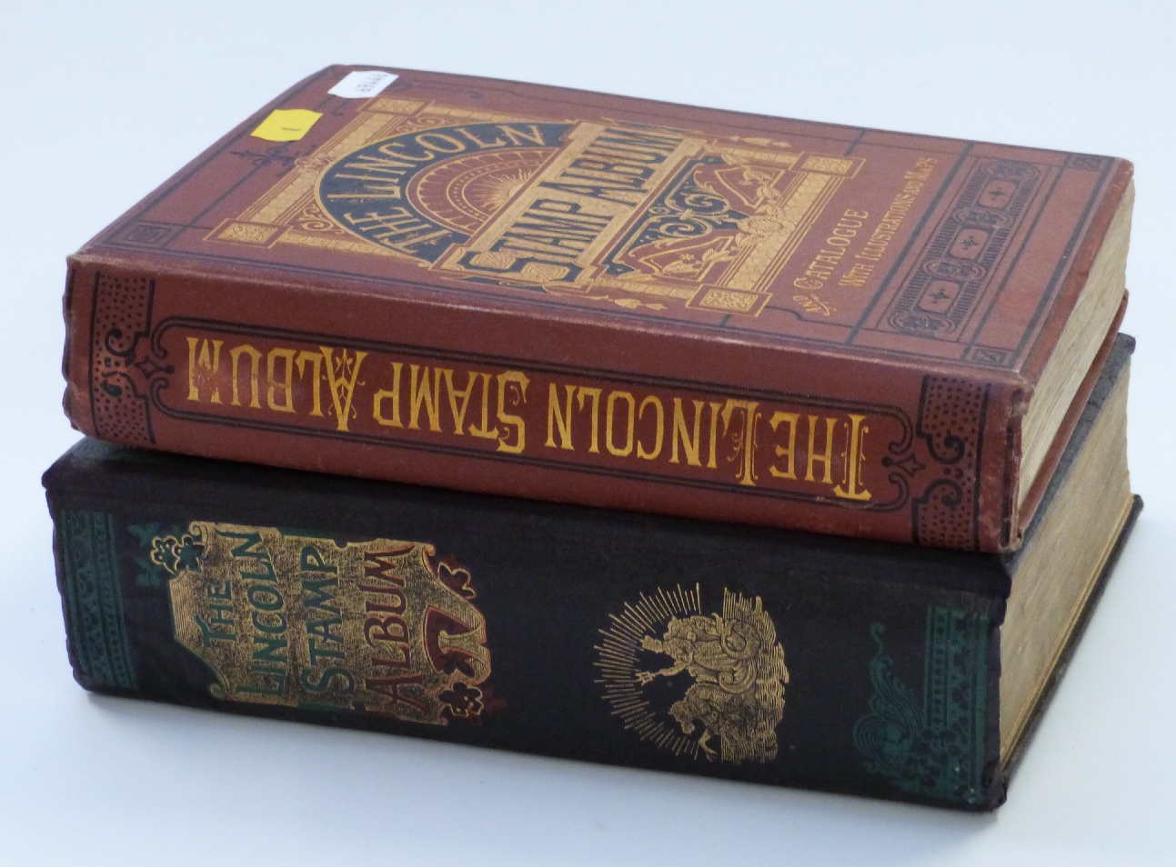 Two Lincoln stamp albums with a wide selection of mainly early stamps