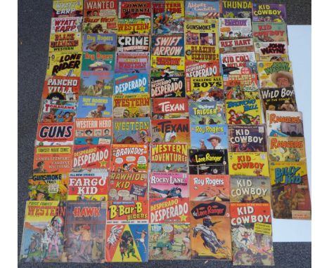 Sixty-five vintage cowboy and Western comics including Kid Cowboy, Billy The Kid, Rangers, John Wayne, Wild Boy, Thunda, B-Ba