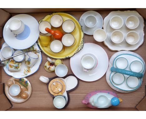 Collection of egg cruets including one kitsch example with figural duck handle, Royal Worcester majolica style etc, tallest 1