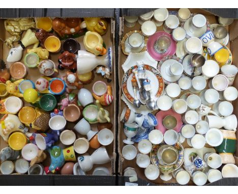 Approximately 70 novelty egg cups including Royal Albert, Spode Italian, Limoges, saucer types, figural novelty etc