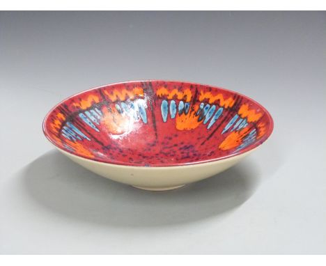 Poole pottery pedestal dish with orange and blue decoration on a red ground, H9, Diameter 34cm&nbsp;
