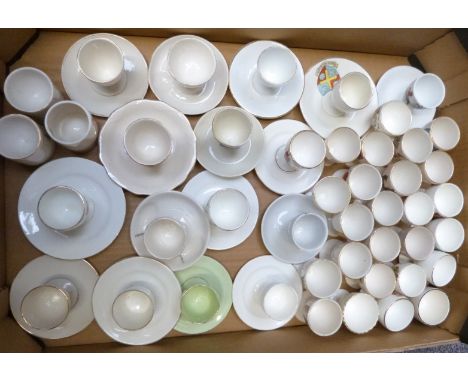 Approximately 47&nbsp;novelty egg cups, all crested ware, including Goss, Arcadian, unmarked etc