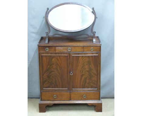 A 19thC mahogany gallery topped cabinet with five oak lined drawers raised on bracket feet, together with a dressing table mi