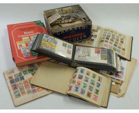 A collection of stamps to include first day covers, Suffolk stamp album and other sundry all world stamps loose and in packet