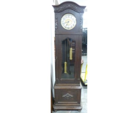 An early 20thC oak longcase clock, H212cm