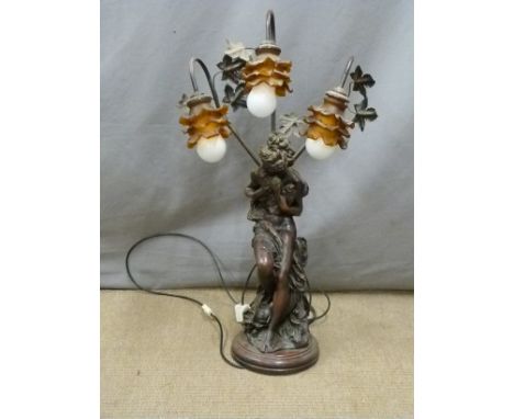 An ornate figural three branch lamp, H81cm&nbsp;