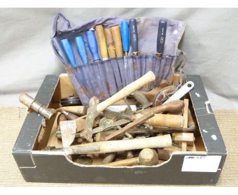 A collection of woodworking tools including planes, chisels, folding rulers etc