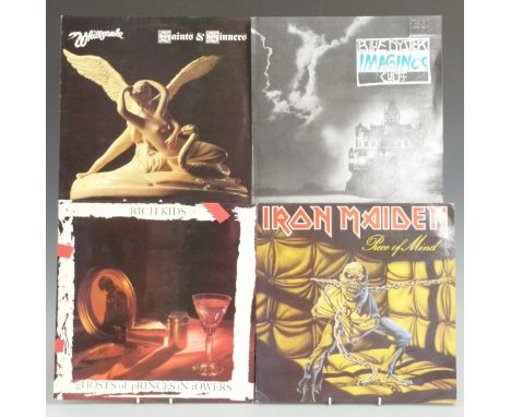 Fifteen albums with promo stamps/labels on rear cover including The Rolling Stones, Rush, Iron Maiden, Whitesnake, Blue Oyste