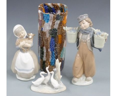 Three Nao figures and a glass vase, tallest 25cm&nbsp;