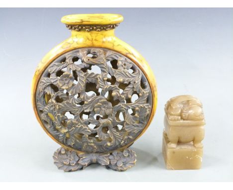 A large Chinese carved hardstone seal (13cm tall) and a pierced moon flask, tallest 27cm&nbsp;