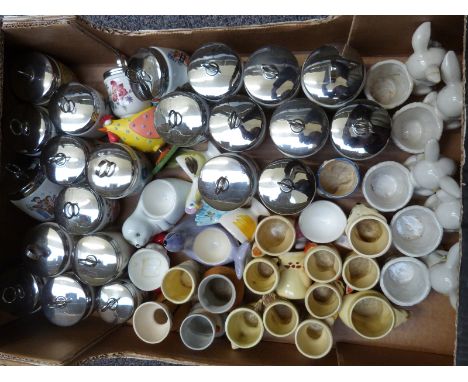 Approximately 33 Royal Worcester egg coddlers and further novelty egg cups