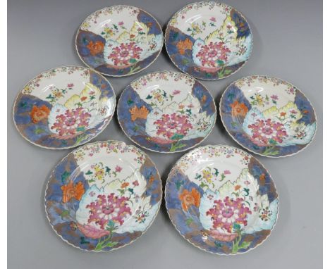 Seven 18th/ 19thC Chinese tobacco leaf pattern cabinet plates painted with large, colourful leaves and flowers and highlighte