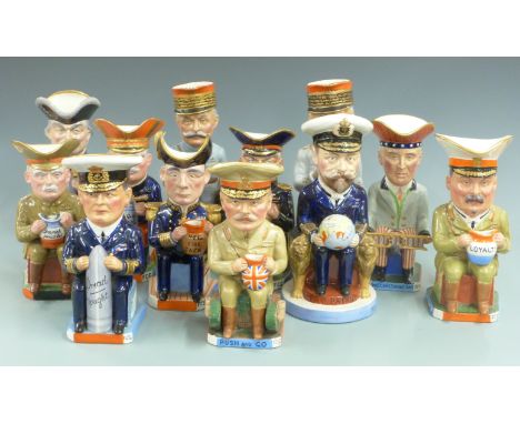 A full set of 11, plus a duplicate (12) Wilkinson Toby jugs designed by Sir Francis Carruthers Gould, modelled in the form of