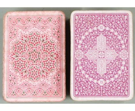 Two packs of De La Rue &amp; Co. London playing cards, both with three pence duty aces, double ended court cards, one pack wi